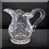 G25. Footed pitcher with handle. 6”h - $8 